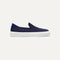 side | The Kids slip-on Sneaker in Deep Navy shown from a side view showing the outsole.