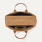 The Weekender in Hazelnut shown from the top with zipper side compartment and magnetic side compartment open. 