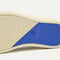 The sole of The Kids Strap Sneaker in Spruce Camo.