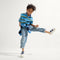 model | Alternate image of a boy modeling The Kids Strap Sneaker in Blue Raspberry. 