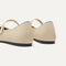 Close up of the heel of The Square Mary Jane in Cream Captoe, with Rothy's signature blue halo. 