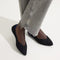 hover | Model wearing The Point II in Black Boucle. 