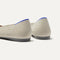Close up of the heel of The Point II in Diamond Twill, with Rothy's signature blue halo. 