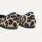 Close up of the heel of The Point II in Desert Cat, with Rothy's signature blue halo. 