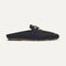 side | The Double Bit Loafer Mule in Black shown from the side.