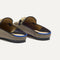 Close up of the heel of The Double Bit Loafer Mule in Classic Micro Check, with Rothy's signature blue halo. 