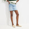 hover | Model wearing The Double Bit Loafer Mule in Sandstone. 