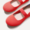 Close up of the toe and vamp of The Kids Mary Jane in Glamour Red.