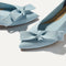 macro | Close up of The Bow Point II in Powder Blue, shown in diagonal view. 
