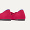 Close up of the heel of The Bow Point II in Rouge, with Rothy's signature blue halo.
