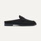 side | The Penny Loafer Mule in Black shown from the side.