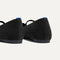 Close up of the heel of The Max Square Mary Jane in ReVelvet™ Black, with Rothy's signature blue halo.