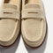Close up of the toe and vamp of The Penny Loafer in Conch Raffia-Knit.