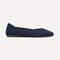 side | The Daily Flat in Navy shown from the side. 