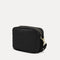 The Crossbody Camera Bag in Black Licorice Open-Knit, shown from the side. 