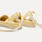 Close up of the heel of The D'Orsay Espadrille in Sunshine Stripe, showing removable ankle straps.