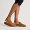 hover | Model wearing The Penny Clog in ReVelvet Caramel.