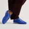 hover | Model wearing The Ivy Sneaker in ReVelvet Cobalt. 