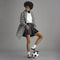 model | Alternate view of a model wearing The Ivy Sneaker in ReVelvet Cheetah. 