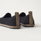 The Mini Loafer in ReVelvet™ Black shown from the back view with the heel detail.