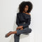 Alternate view of a model wearing The Point II in Chantilly Noir. 