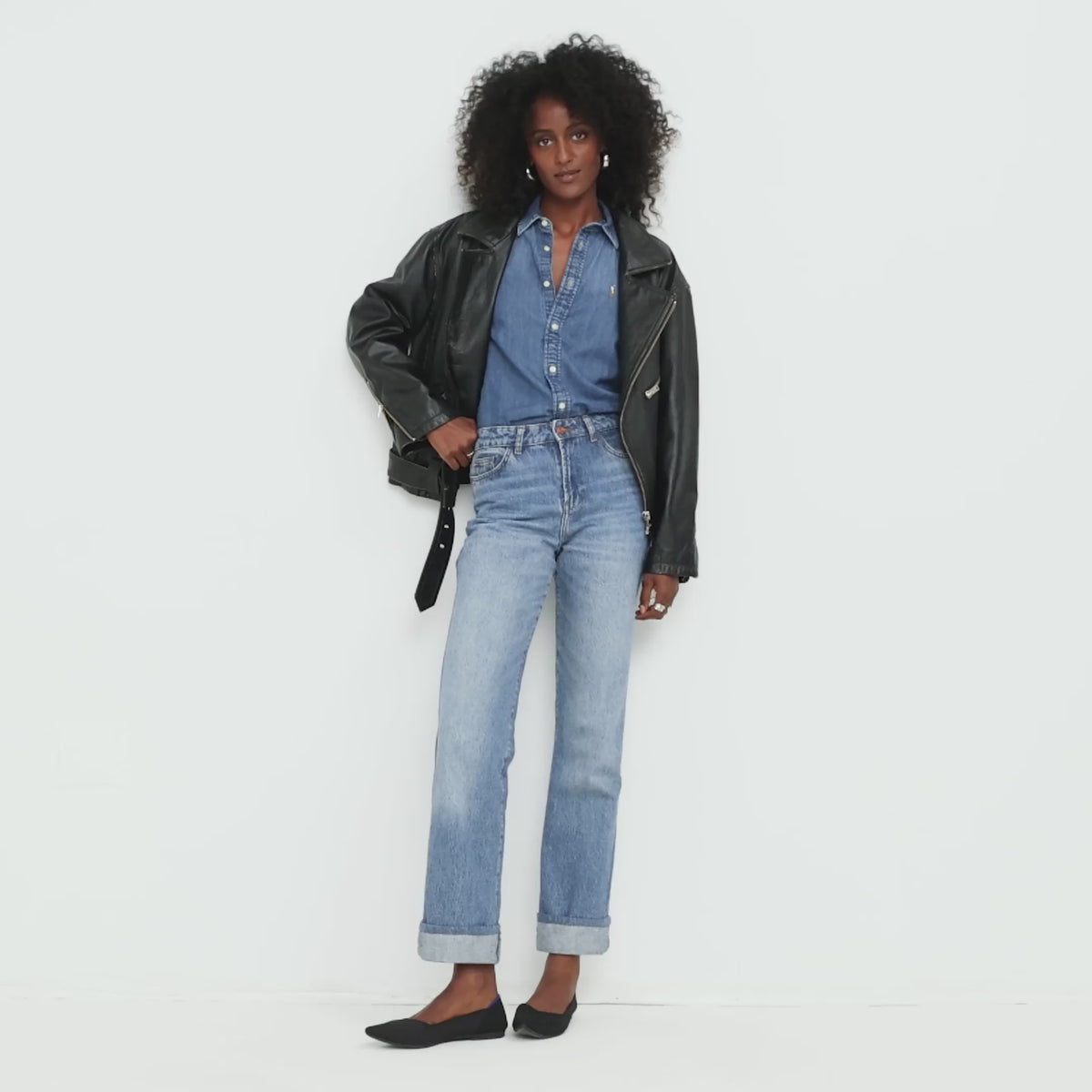 Model walking in The Point II in Black and showing different angles of the flat. 