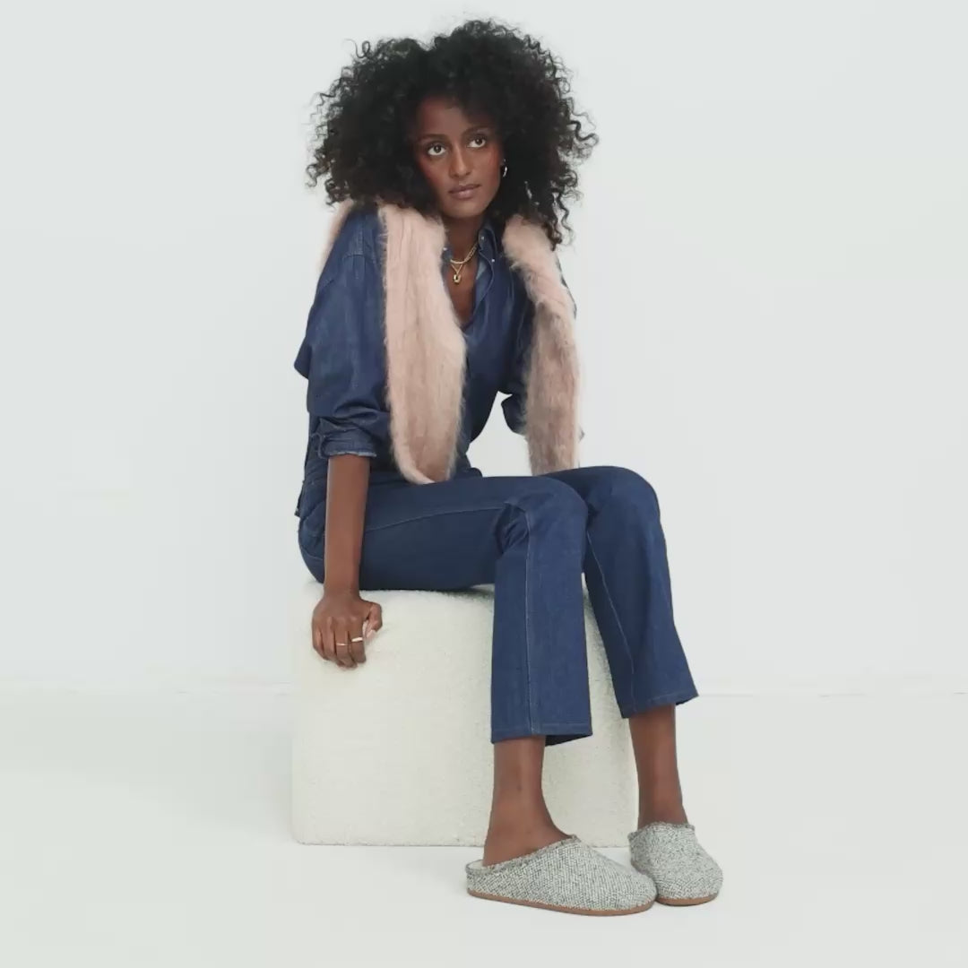 Model walking in The Cozy Clog in Cookies and Cream Boucle and showing different angles of the shoes. 